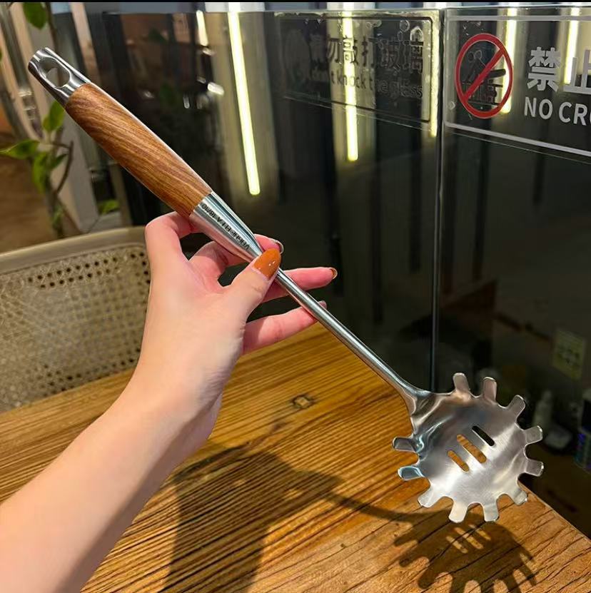 Stainless steel noodle scoop with pearwood handle