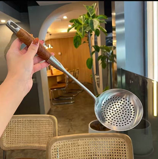 Stainless steel colander with pearwood handle
